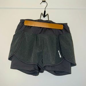 Reebok running shorts with spandex.